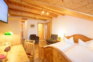 Postel nebo postele na pokoji v ubytování Akzent Hotel Alpenrose