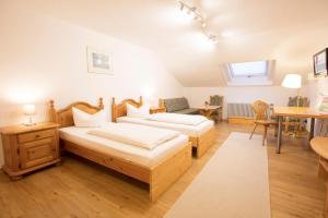 Postel nebo postele na pokoji v ubytování Akzent Hotel Alpenrose