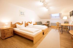 Postel nebo postele na pokoji v ubytování Akzent Hotel Alpenrose