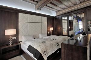 Posteľ alebo postele v izbe v ubytovaní Hotel Grand