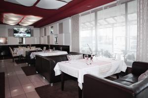 Un restaurante u otro lugar para comer en Hotel Palma
