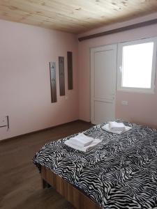 Letto o letti in una camera di Guest House Khergiani