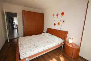 Postel nebo postele na pokoji v ubytování Apartments Nadia