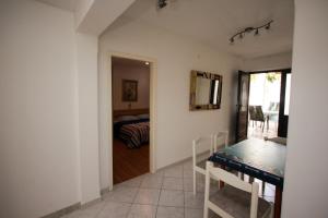 Postel nebo postele na pokoji v ubytování Apartments Nadia
