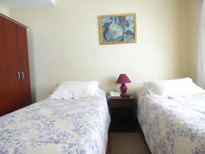 Postel nebo postele na pokoji v ubytování Hotel Vista Hermosa 17