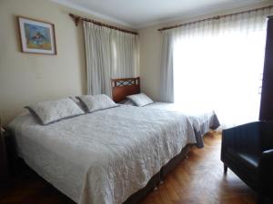 Postel nebo postele na pokoji v ubytování Hotel Vista Hermosa 17