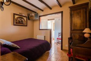 Posteľ alebo postele v izbe v ubytovaní Casa Banys L'Avellà