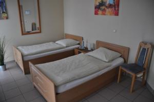Voodi või voodid majutusasutuse Hotel Neuzeit toas