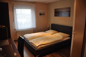 Voodi või voodid majutusasutuse Hotel Neuzeit toas