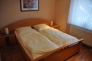 Voodi või voodid majutusasutuse Hotel Neuzeit toas