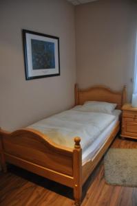 Postel nebo postele na pokoji v ubytování Hotel Neuzeit