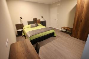 Postel nebo postele na pokoji v ubytování Pove 2.4 Hotel