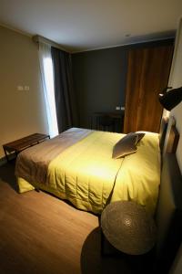 Postel nebo postele na pokoji v ubytování Pove 2.4 Hotel