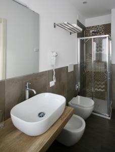 Koupelna v ubytování Pove 2.4 Hotel