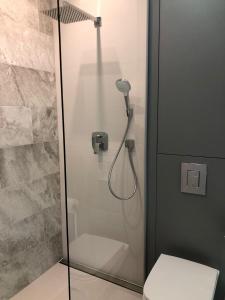 Vonios kambarys apgyvendinimo įstaigoje Apartament Comfort Zone