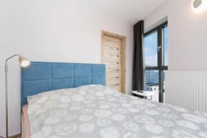 Posteľ alebo postele v izbe v ubytovaní Apartament Iwona Międzyzdroje