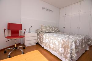 Voodi või voodid majutusasutuse Apartamento Torre Cristal toas