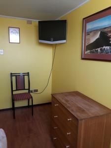 TV a/nebo společenská místnost v ubytování Hotel Aymara + 16 fotografií