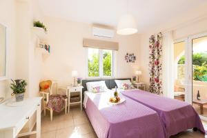 Posteľ alebo postele v izbe v ubytovaní Seaside Villa Konaki + 24 fotografií
