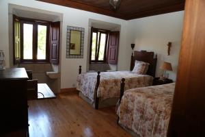 Postel nebo postele na pokoji v ubytování Quinta de Santa Maria