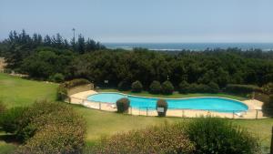 Πισίνα στο ή κοντά στο Departamento Mantagua