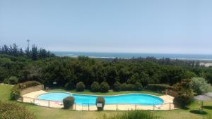 Πισίνα στο ή κοντά στο Departamento Mantagua