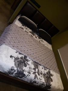Llit o llits en una habitació de Belen - Service Apartment