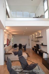 a living room with a couch and a table at Villa Cristal in La Orotava