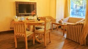 Posezení v ubytování Dee Marks Airport Hotel & Resorts