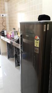 Kuchyň nebo kuchyňský kout v ubytování Galaxy Apartment