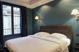 Ze Perfect Place - Élégant appartement avec terrasse - Promenade des Arts tesisinde bir odada yatak veya yataklar
