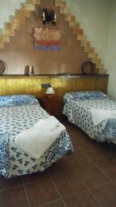מיטה או מיטות בחדר ב-Ruralvilla5