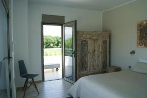 Postel nebo postele na pokoji v ubytování Manna Gea + 37 fotografií