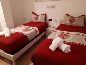Postel nebo postele na pokoji v ubytování casa Lory