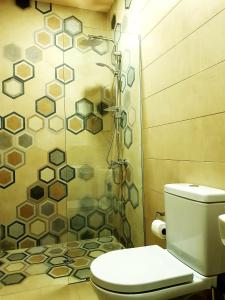 Baðherbergi á Cozy Hotel Kazbegi
