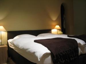 Voodi või voodid majutusasutuse B&B 't Wit Huys Brugge toas