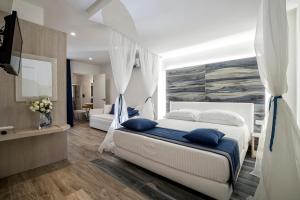 Katil atau katil-katil dalam bilik di Il Mare Dentro Rooms