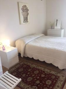 
A bed or beds in a room at Casa Vento dello Stagnone
