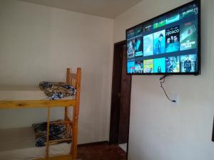 Телевизор и/или развлекательный центр в Apart São Gabriel
