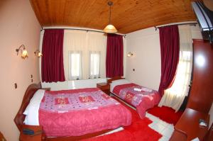 A bed or beds in a room at Lefteris