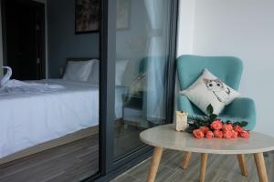 Postel nebo postele na pokoji v ubytování Dalat Memory Inn