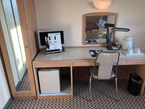 Kuchyň nebo kuchyňský kout v ubytování Hotel Hikari Hills