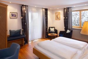 Postel nebo postele na pokoji v ubytování Hotel Menning ***S