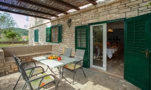 Patio nebo venkovní prostory v ubytování Komun Apartments