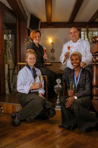 a group of people sitting in a room with wine glasses at Wegermann`s BIO-Landhaus im Wodantal in Hattingen