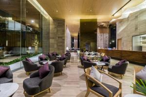 Posezení v ubytování Arize Hotel Sri Racha