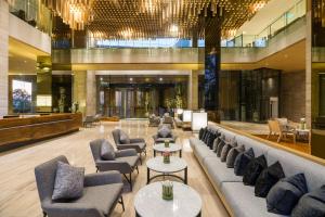 Posezení v ubytování Arize Hotel Sri Racha
