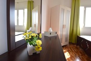 A bed or beds in a room at Lana Villa