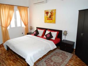 A bed or beds in a room at Lana Villa