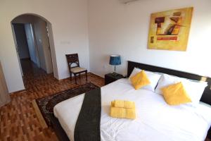 A bed or beds in a room at Lana Villa